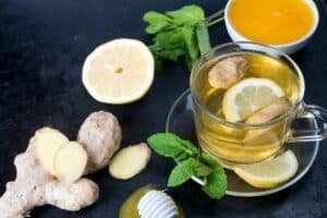 fresh ginger root tea with lemon mint and honey