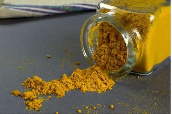 ground turmeric in a jar