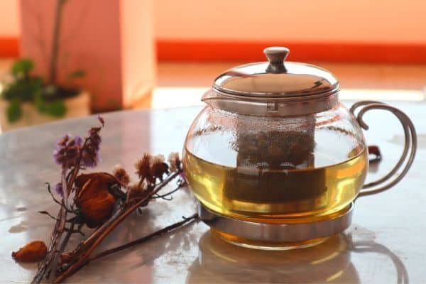 jasmine tea in a glass kettle