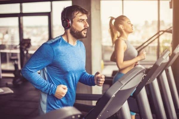 man and woman exercising