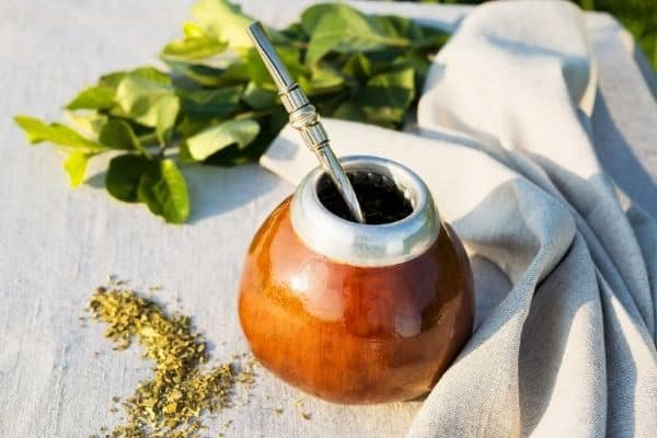 yerba mate gourd bombilla and leaves