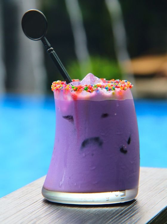 purple milk tea in a glass