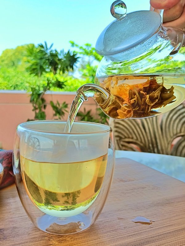 pouring blooming tea
